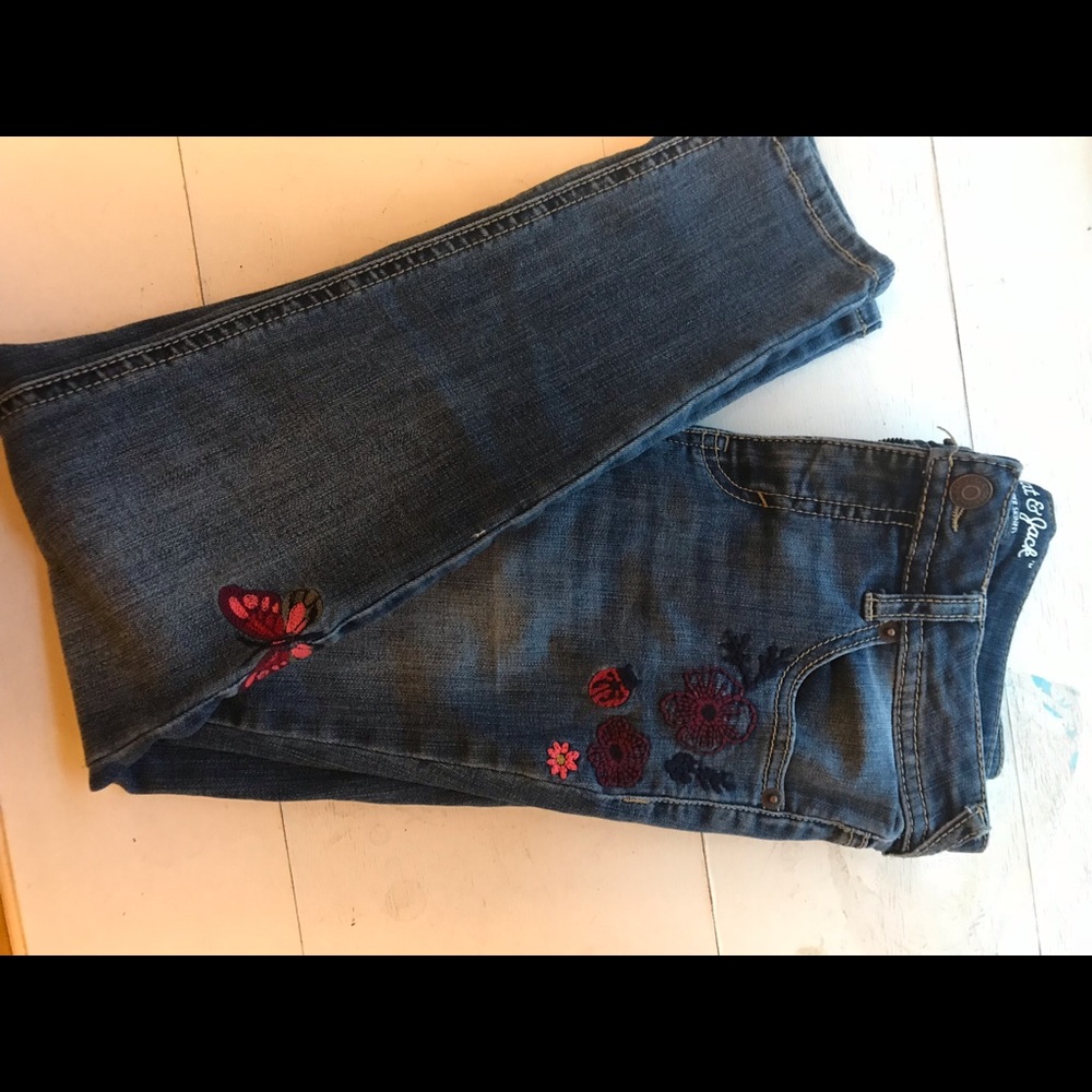 Flower and butterfly embroidered jeans